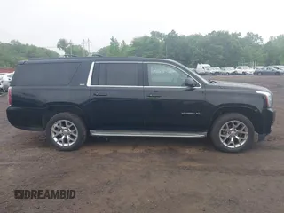 2015 GMC Yukon XL SLT z VIN 1GKS2HKC1FR146778, wystawiony jako IAAI lot #42449315 z przebiegiem 197 577 mil mil oraz . Historia ofert i sprzedaży dostępna na DreamBid. Obrazek 13.