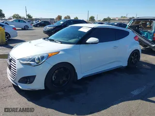 2014 Hyundai Veloster Turbo with VIN KMHTC6AE5EU201714, listed as a IAAI auction lot 40671069 with 151,901 mi miles. Bid and sale history available at carsss.com. Image 17.
