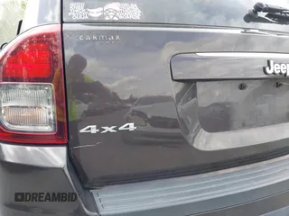 2014 Jeep Compass Latitude with VIN 1C4NJDEBXED622352, listed as a IAAI auction lot 42130403 with 149,024 mi miles. Bid and sale history available at carsss.com. Image 13.