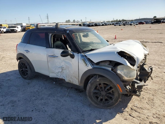 2011 MINI Cooper Countryman with VIN WMWZB3C59BWH94541, listed as a Copart auction lot 87177514 with 186,979 mi miles and Salvage Title. Bid and sale history available at carsss.com. Image 4.