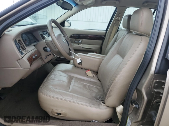 2005 Mercury Grand Marquis LS Premium z VIN 2MEFM75W15X660639, wystawiony jako Copart lot #56580605 z przebiegiem 149 136 mil mil oraz Szkody całkowita. Historia ofert i sprzedaży dostępna na DreamBid. Obrazek 7.