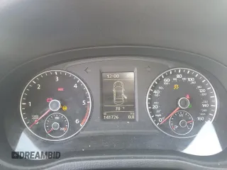 2014 Volkswagen Passat SE z VIN 1VWBN7A30EC084173, wystawiony jako Copart lot #58688645 z przebiegiem 141 726 mil mil oraz Szkoda całkowita • Salvage title. Historia ofert i sprzedaży dostępna na DreamBid. Obrazek 9.