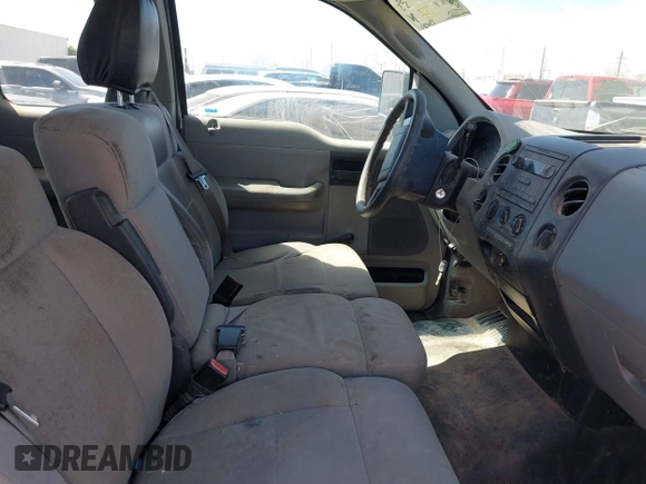2007 Ford F-150 STX with VIN 1FTRX12W67NA51557, listed as a IAAI auction lot 41799858 with 107,210 mi miles and . Bid and sale history available at DreamBid. Image 5.