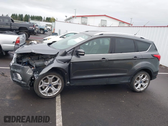 2019 Ford Escape Titanium with VIN 1FMCU9J99KUA64158, listed as a IAAI auction lot 41980102 with 52,514 mi miles. Bid and sale history available at carsss.com. Image 15.