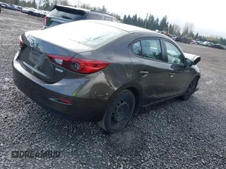 2016 Mazda 3 i Sport with VIN JM1BM1T7XG1298654, listed as a IAAI auction lot 41946415 with 114,894 mi miles and . Bid and sale history available at carsss.com. Image 4.