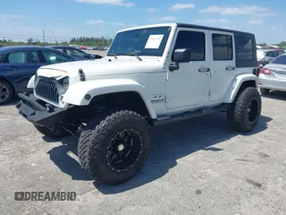 2010 Jeep Wrangler z VIN 1J4HB5H16AL186600, wystawiony jako IAAI lot #42147992 z przebiegiem 134 717 mil mil oraz . Historia ofert i sprzedaży dostępna na DreamBid. Obrazek 17.