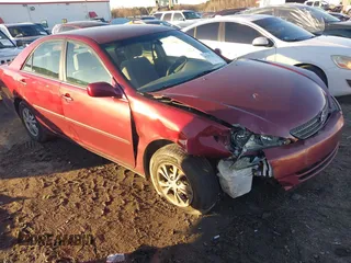 2004 Toyota Camry LE with VIN 4T1BF32K94U063857, listed as a IAAI auction lot 41253252 with 249,356 mi miles. Bid and sale history available at carsss.com. Image 1.