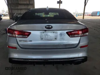 2020 Kia Optima LX z VIN 5XXGT4L31LG382738, wystawiony jako Copart lot #55754205 z przebiegiem 91 605 mil mil oraz Szkoda całkowita • Salvage title. Historia ofert i sprzedaży dostępna na DreamBid. Obrazek 6.