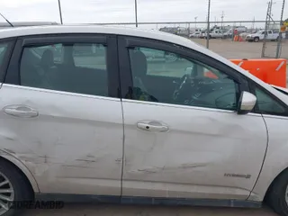 2013 Ford C-Max Hybrid SEL with VIN 1FADP5BU7DL544628, listed as a IAAI auction lot 41583426 with 230,761 mi miles. Bid and sale history available at carsss.com. Image 12.