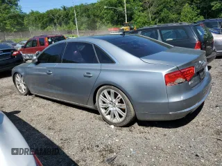 2012 Audi A8 z VIN WAURVAFDXCN001167, wystawiony jako Copart lot #57227105 z przebiegiem 154 409 mil mil oraz Szkoda całkowita • Salvage title. Historia ofert i sprzedaży dostępna na DreamBid. Obrazek 2.