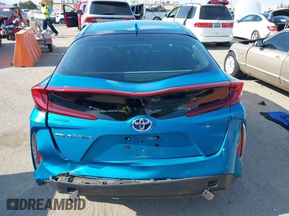 2022 Toyota Prius LE with VIN JTDKAMFP8N3209977, listed as a IAAI auction lot 42777763 with 52,995 mi miles and . Bid and sale history available at DreamBid. Image 17.