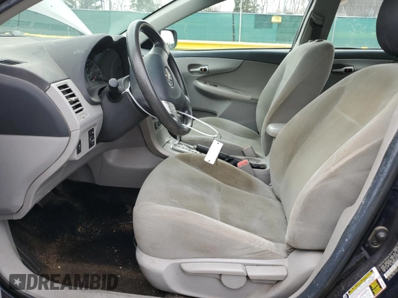 2012 Toyota Corolla L with VIN 2T1BU4EE2CC765245, listed as a Copart auction lot 52449945 with 152,557 mi miles and Salvage Title. Bid and sale history available at DreamBid. Image 7.