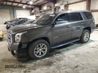 2020 GMC Yukon SLT Standard Edition with VIN 1GKS2DKC5LR286112, listed as a Copart auction lot 82692994 with 87,959 mi miles and Salvage Title. Bid and sale history available at carsss.com. Image 1.