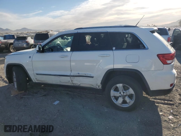 2011 Jeep Grand Cherokee Laredo with VIN 1J4RR4GG5BC503705, listed as a Copart auction lot 50014895 with 180,999 mi miles and Salvage title. Bid and sale history available at DreamBid. Image 2.