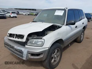 1998 Toyota RAV4 with VIN JT3GP10V3W7038970, listed as a IAAI auction lot 42377816 with 221,365 mi miles and . Bid and sale history available at DreamBid. Image 2.