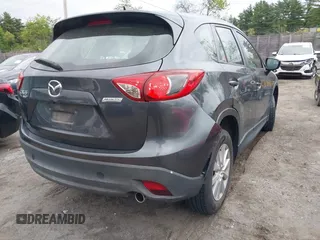 2016 Mazda CX-5 Sport with VIN JM3KE4BY9G0710004, listed as a IAAI auction lot 42323434 with 83,320 mi miles and . Bid and sale history available at DreamBid. Image 6.