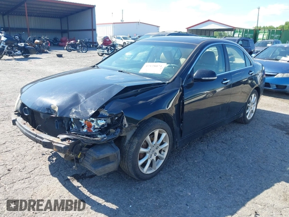 2008 Acura TSX Nav with VIN JH4CL96908C013256, listed as a IAAI auction lot 42128071 with 187,881 mi miles and . Bid and sale history available at DreamBid. Image 2.