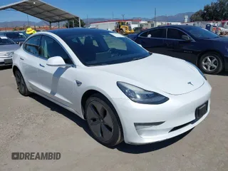 2019 Tesla Model 3 Mid Range with VIN 5YJ3E1EA1KF422983, listed as a IAAI auction lot 41861334 with 53,017 mi miles. Bid and sale history available at carsss.com. Image 1.