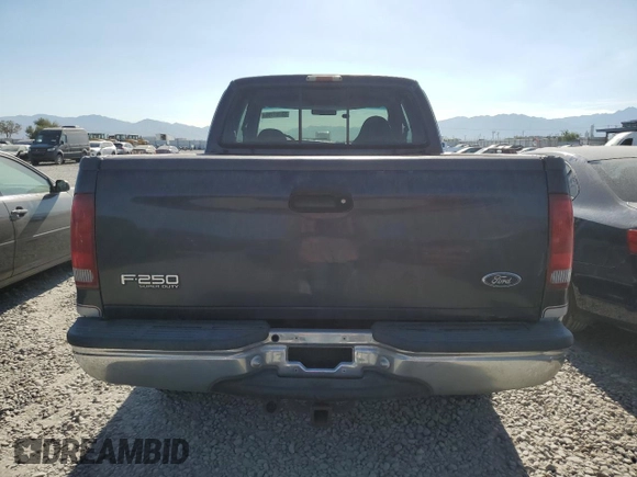 1999 Ford F-250 XL with VIN 1FTNX21L0XED19451, listed as a Copart auction lot 65787795 with 140,812 mi miles and Clean title. Bid and sale history available at DreamBid. Image 6.