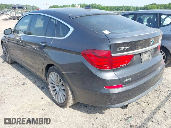 2013 BMW 5 Series GT 535i xDrive with VIN WBASP2C59DC339770, listed as a IAAI auction lot 42171135 with 106,625 mi miles. Bid and sale history available at carsss.com. Image 3.