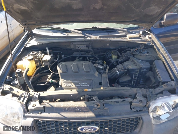 2003 Ford Escape XLS Popular with VIN 1FMYU02133KA02990, listed as a IAAI auction lot 41803174 with 140,792 mi miles. Bid and sale history available at carsss.com. Image 10.