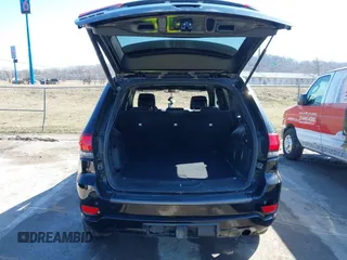 2021 Jeep Grand Cherokee 80th Anniversary with VIN 1C4RJFBG9MC745643, listed as a IAAI auction lot 41729989 with 88,567 mi miles and . Bid and sale history available at DreamBid. Image 18.