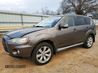 2011 Mitsubishi Outlander XLS z VIN JA4JS4AX9BU008993, wystawiony jako Copart lot #86159564 z przebiegiem 180 769 mil mil oraz Szkoda całkowita • Salvage title. Historia ofert i sprzedaży dostępna na DreamBid. Obrazek 1.