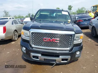 2016 GMC Sierra 2500HD Denali z VIN 1GT12UE84GF259750, wystawiony jako IAAI lot #42221632 z przebiegiem 201 055 mil mil oraz . Historia ofert i sprzedaży dostępna na DreamBid. Obrazek 13.
