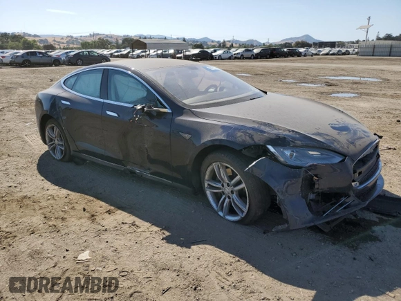 2013 Tesla Model S with VIN 5YJSA1AC9DFP10400, listed as a Copart auction lot 59047985 with 165,166 mi miles and Salvage title. Bid and sale history available at DreamBid. Image 4.