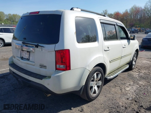 2013 Honda Pilot Touring with VIN 5FNYF4H97DB069979, listed as a IAAI auction lot 42133922 with 276,574 mi miles and . Bid and sale history available at carsss.com. Image 4.