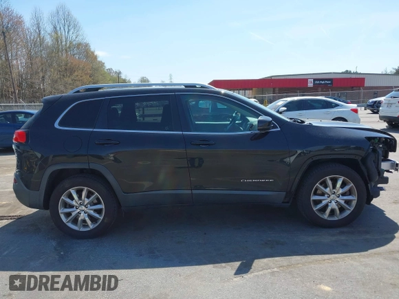 2015 Jeep Cherokee Limited with VIN 1C4PJMDS9FW711040, listed as a IAAI auction lot 41904050 with 137,742 mi miles. Bid and sale history available at carsss.com. Image 13.