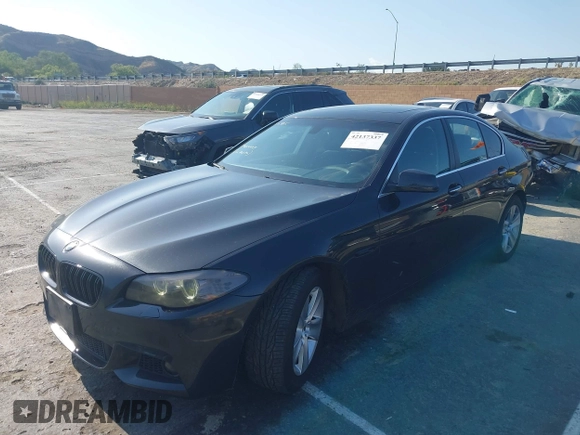 2013 BMW 5 Series 528i with VIN WBAXG5C58DD232579, listed as a IAAI auction lot 42137337 with 84,717 mi miles and . Bid and sale history available at DreamBid. Image 2.