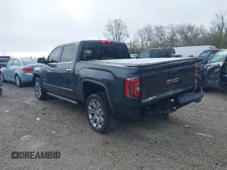 2017 GMC Sierra 1500 Denali with VIN 3GTU2PEJ5HG313350, listed as a IAAI auction lot 41968608 with 73,963 mi miles and . Bid and sale history available at DreamBid. Image 3.