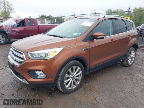 2017 Ford Escape Titanium with VIN 1FMCU0JD3HUB20846, listed as a IAAI auction lot 42182260 with 28,610 mi miles and . Bid and sale history available at DreamBid. Image 21.