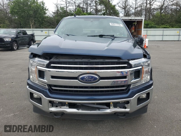 2019 Ford F-150 XL with VIN 1FTEW1E55KFC10642, listed as a Copart auction lot 62811755 with 128,286 mi miles and Salvage title. Bid and sale history available at DreamBid. Image 5.