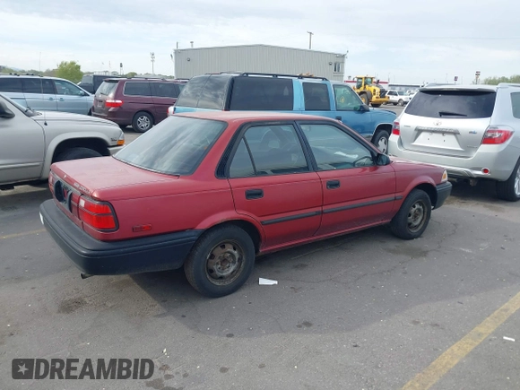 1991 Toyota Corolla z VIN 1NXAE94AXMZ209706, wystawiony jako IAAI lot #42099208 z przebiegiem 192 222 mil mil oraz . Historia ofert i sprzedaży dostępna na DreamBid. Obrazek 4.