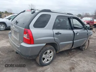 2010 Kia Sportage LX with VIN KNDKGCA33A7718634, listed as a IAAI auction lot 41868565 with 197,967 mi miles and . Bid and sale history available at carsss.com. Image 4.