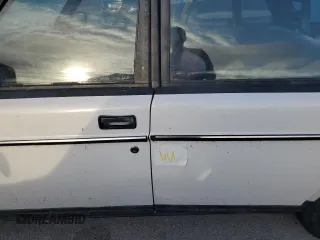 1991 Volvo 240 z VIN YV1AA8844M1441146, wystawiony jako Copart lot #75018744 z przebiegiem 159 330 mil mil oraz Nie do naprawy. Historia ofert i sprzedaży dostępna na DreamBid. Obrazek 12.