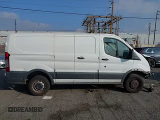 2015 Ford Transit Cargo with VIN 1FTYR1ZM7FKB05121, listed as a IAAI auction lot 41461900 with 190,821 mi miles and . Bid and sale history available at DreamBid. Image 13.