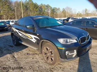 2013 BMW X6 xDrive35i with VIN 5UXFG2C58DL786125, listed as a IAAI auction lot 41448691 with 216,197 mi miles. Bid and sale history available at carsss.com. Image 1.