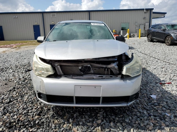 2009 Ford Focus SE with VIN 1FAHP35N09W267059, listed as a Copart auction lot 54155965 with 129,768 mi miles and Salvage Title. Bid and sale history available at carsss.com. Image 5.