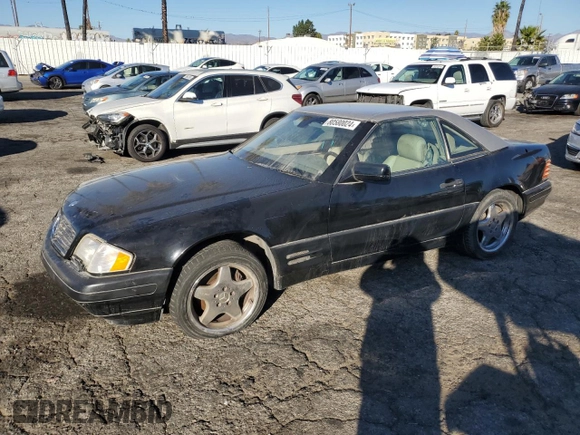 1997 Mercedes-Benz SL 500 z VIN WDBFA63F5VF144026, wystawiony jako Copart lot #80580024 z przebiegiem 138 776 mil mil oraz Czysty tytuł • Clean title. Historia ofert i sprzedaży dostępna na DreamBid. Obrazek 1.