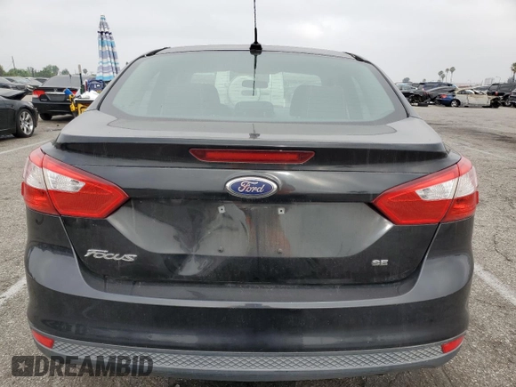 2013 Ford Focus SE z VIN 1FADP3F20DL335132, wystawiony jako Copart lot #61042315 z przebiegiem 149 443 mil mil oraz Czysty tytuł • Clean title. Historia ofert i sprzedaży dostępna na DreamBid. Obrazek 6.