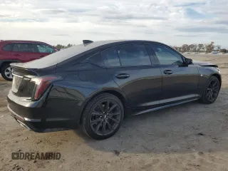2023 Cadillac CT5 Sport z VIN 1G6DU5RK8P0103509, wystawiony jako Copart lot #79586944 z przebiegiem 27 753 mil mil oraz Szkoda całkowita • Salvage title. Historia ofert i sprzedaży dostępna na DreamBid. Obrazek 3.