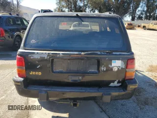1993 Jeep Grand Cherokee Limited with VIN 1J4GZ78S3PC502345, listed as a Copart auction lot 46933805 with 121,652 mi miles and Salvage title. Bid and sale history available at DreamBid. Image 6.