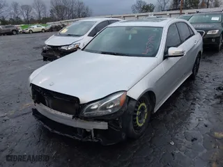 2014 Mercedes-Benz E-Class E 350 Sport with VIN WDDHF5KB4EA876770, listed as a IAAI auction lot 41531940 with 121,993 mi miles. Bid and sale history available at carsss.com. Image 2.