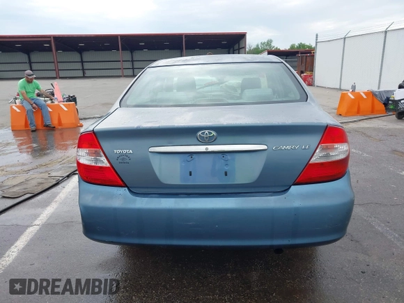 2002 Toyota Camry LE z VIN 4T1BE32KX2U617732, wystawiony jako IAAI lot #42208913 z przebiegiem Nie podano mil oraz . Historia ofert i sprzedaży dostępna na DreamBid. Obrazek 16.