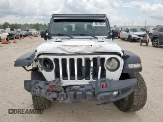 2023 Jeep Gladiator Rubicon with VIN 1C6JJTBG8PL532271, listed as a Copart auction lot 58220565 with 34,172 mi miles and Salvage title. Bid and sale history available at DreamBid. Image 5.