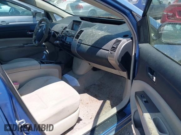 2007 Toyota Prius with VIN JTDKB20U877616564, listed as a IAAI auction lot 42410078 with 335,498 mi miles and . Bid and sale history available at DreamBid. Image 5.
