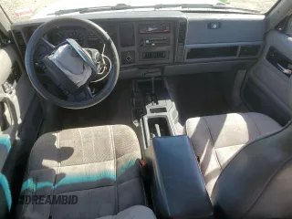 1995 Jeep Cherokee Sport with VIN 1J4FJ68S0SL646747, listed as a Copart auction lot 48772675 with 239,834 mi miles and Salvage title. Bid and sale history available at DreamBid. Image 8.